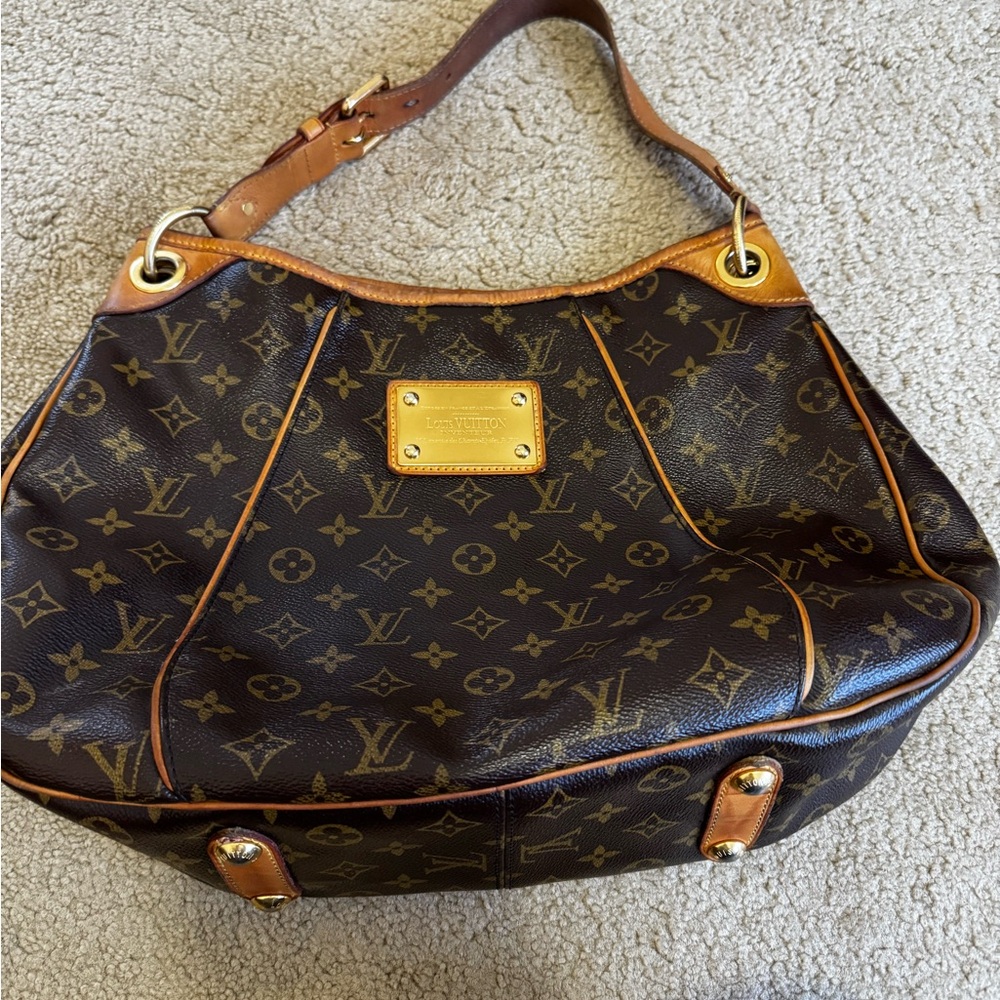 Authentic Louis Vuitton Galleria Bag. Measures 16" by 11.5" tall by 4.5" deep.